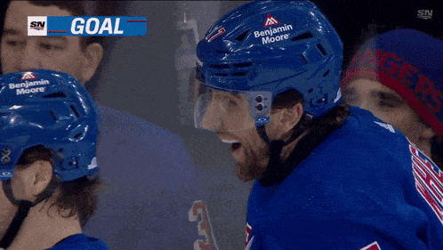 a hockey game is being played between the nyr and the islanders