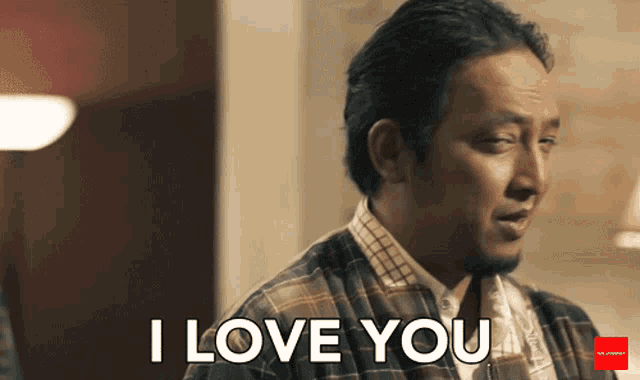 a man says i love you in a plaid shirt