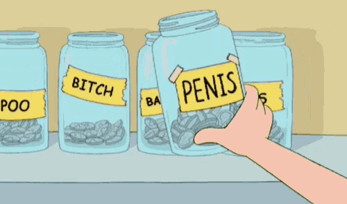 a hand is holding a jar that says penis