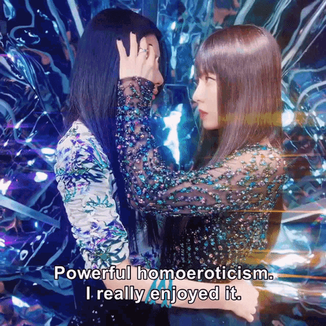 two women standing next to each other with the words powerful homoeroticism i really enjoyed it on the bottom