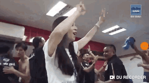 a group of people are dancing in a room with the words du recorder at the bottom of the screen