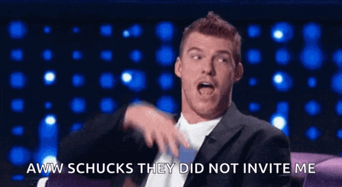 a man in a suit is saying aww schucks they did not invite me .