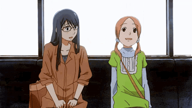 two anime girls are sitting next to each other and one has glasses on
