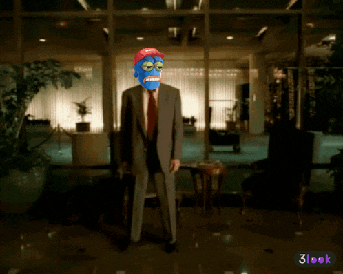a man in a suit and tie with a blue mask on his face is dancing in a room with a 3look logo in the corner