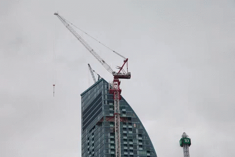 Crane On Skyscraper GIF - Crane Construction Construction Crane GIFs