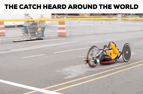 the catch heard around the world is written above a person riding a bike