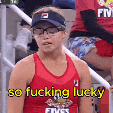 a woman wearing glasses and a red tank top with the words so fucking lucky on it