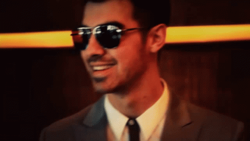 Joe Jonas Smiling GIF - Joe Jonas Smiling Happy GIFs