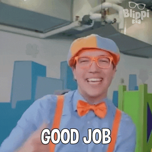 a man in a blue shirt and orange suspenders is smiling and saying good job