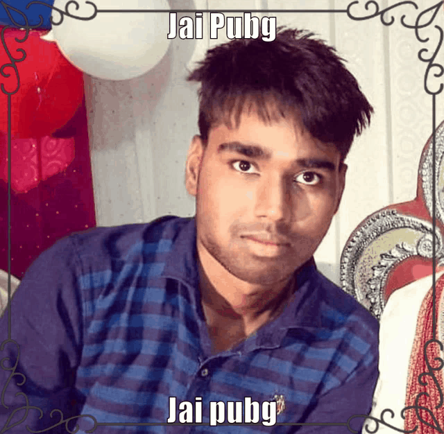 a young man in a blue plaid shirt with jai pubg written on the bottom right