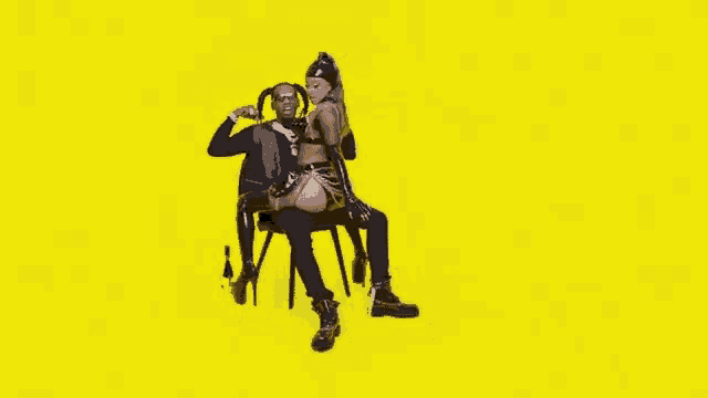 a man is sitting on a chair with a woman sitting on his lap on a yellow background .