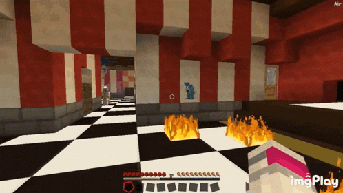 a screenshot of a minecraft game shows a fire in the middle