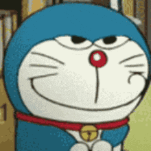 a close up of a doraemon cartoon character with a red nose and a clock around his neck .