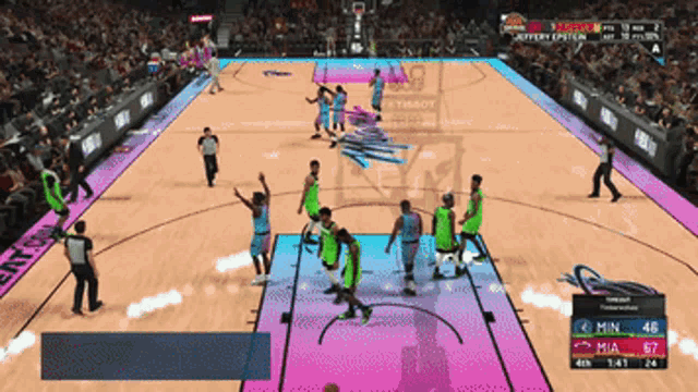 a basketball game is being played on a tissot branded court