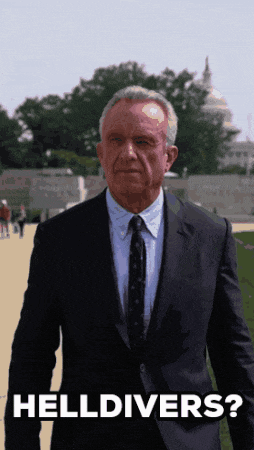 a man in a suit and tie is walking with the words helldivers below him
