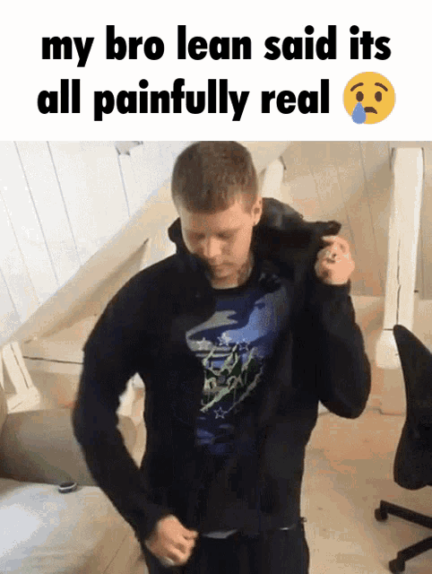 a man wearing a black jacket with the words my bro lean said its all painfully real