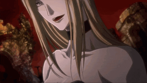 a close up of a woman 's face with long blonde hair