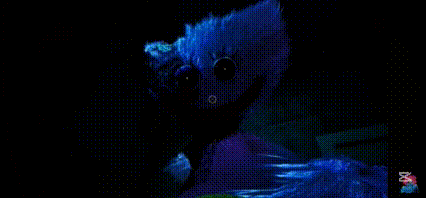 a cartoon character is glowing in the dark and looking at the camera in the dark .