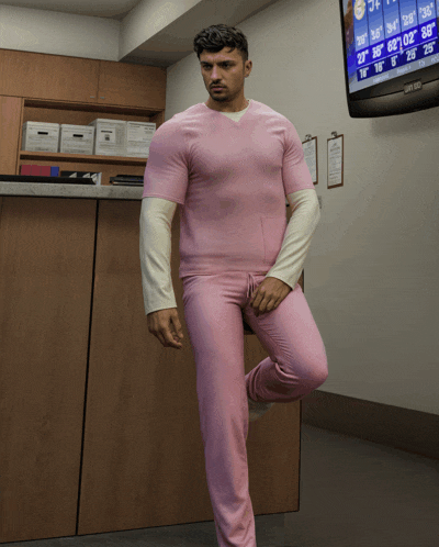 a man in a pink shirt and pink pants stands in front of a monitor showing the temperature as 28 degrees