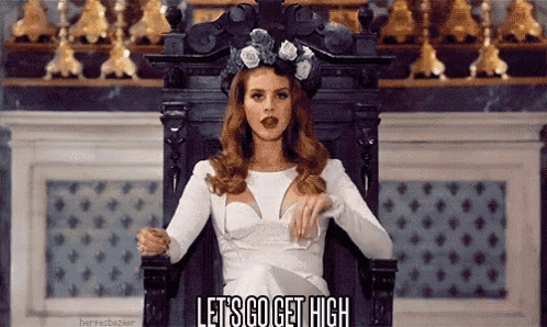 a woman in a white dress is sitting on a throne with the words let 's go get high below her