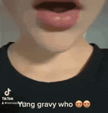 a close up of a person 's mouth with the words `` yung gravy who '' written on the bottom .