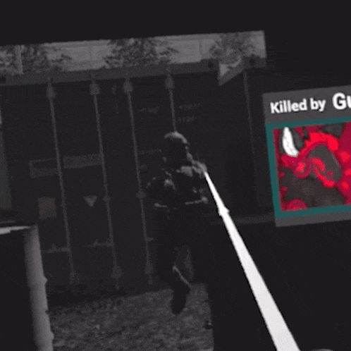 a man is jumping in the air in front of a sign that says killed by c.