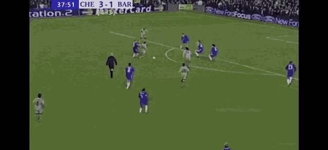 a soccer game is being played in front of a playstation 2 banner