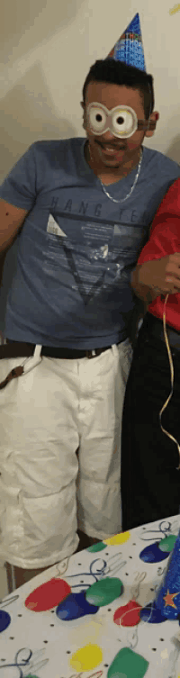 a man wearing a blue shirt that says hang on