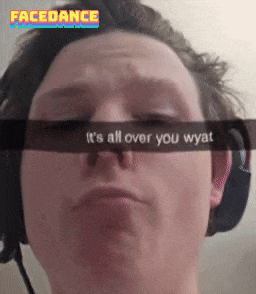 a man wearing headphones has a snap that says " it 's all over you wyat " on it