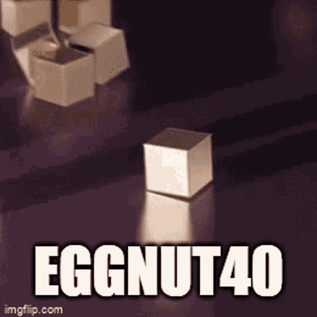 a bunch of cubes with the words eggnut40 written on it