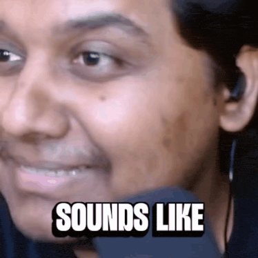 a close up of a person 's face with the words `` sounds like '' written on it .