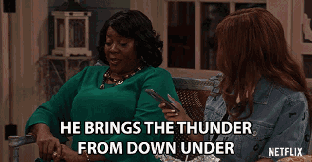 a netflix ad shows two women sitting on a porch with the caption he brings the thunder from down under