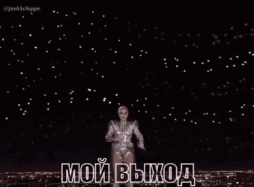 a person is flying through the air in front of a crowd of people .