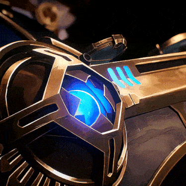 a close up of a metal object with a blue light coming out of the center