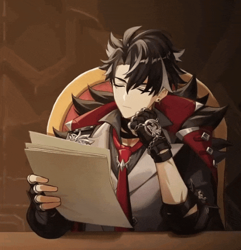 a man sitting at a table reading a book