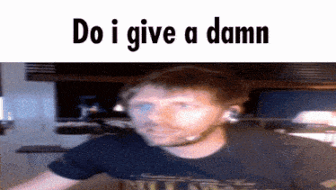 a blurry picture of a man with the words do i give a damn below him