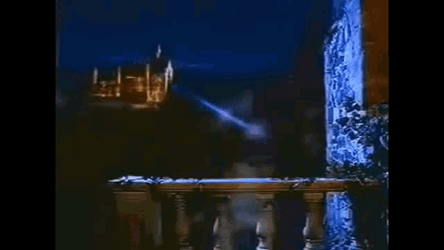 a ghost is walking through a doorway at night with a building in the background .