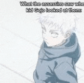 a boy with white hair is wearing a blue hoodie and looking at something .