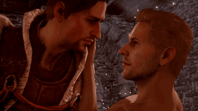 two men are looking at each other and one has his head on the other 's shoulder