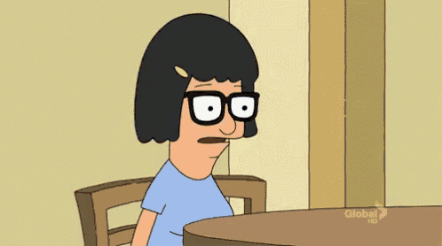 a cartoon character with glasses is sitting at a table with a global tv logo in the background