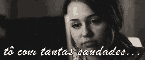 a black and white photo of a woman with the words `` to com tantas saudades '' written on the bottom .