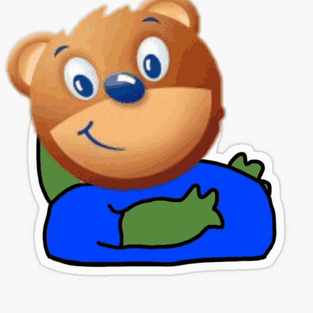 a teddy bear with a green arm and a blue shirt on