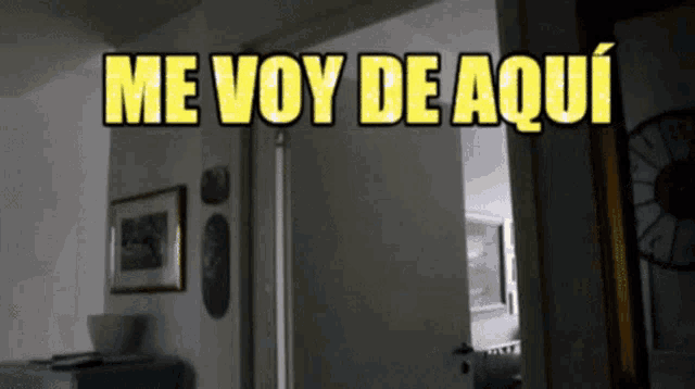 a doorway with the words me voy de aqui on it