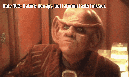 a picture of a man with a caption that says rule 102 nature decays but latinum lasts forever