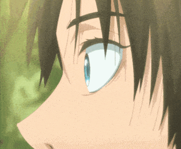 a close up of a person 's blue eye