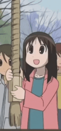 a girl in a pink jacket is holding a very long pole