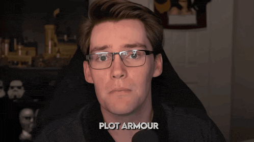 a man with glasses and the word plot armour on the bottom right
