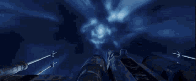 a star wars x-wing fighter jet is flying through a space tunnel .