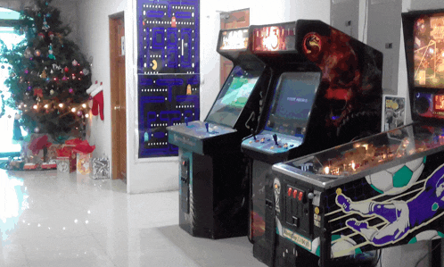 two arcade machines one of which is a mortal kombat game