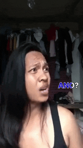 a woman is making a funny face with ano written on her face